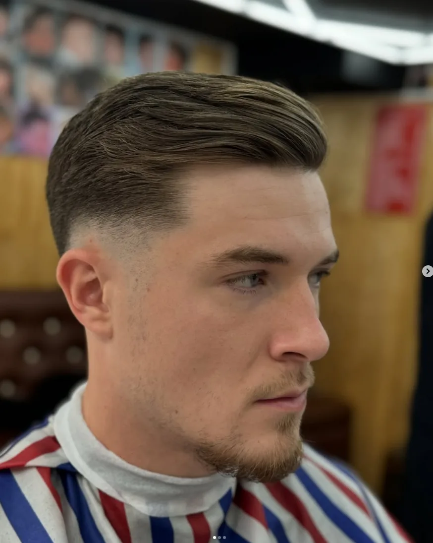 Close-up of a classic side-part haircut